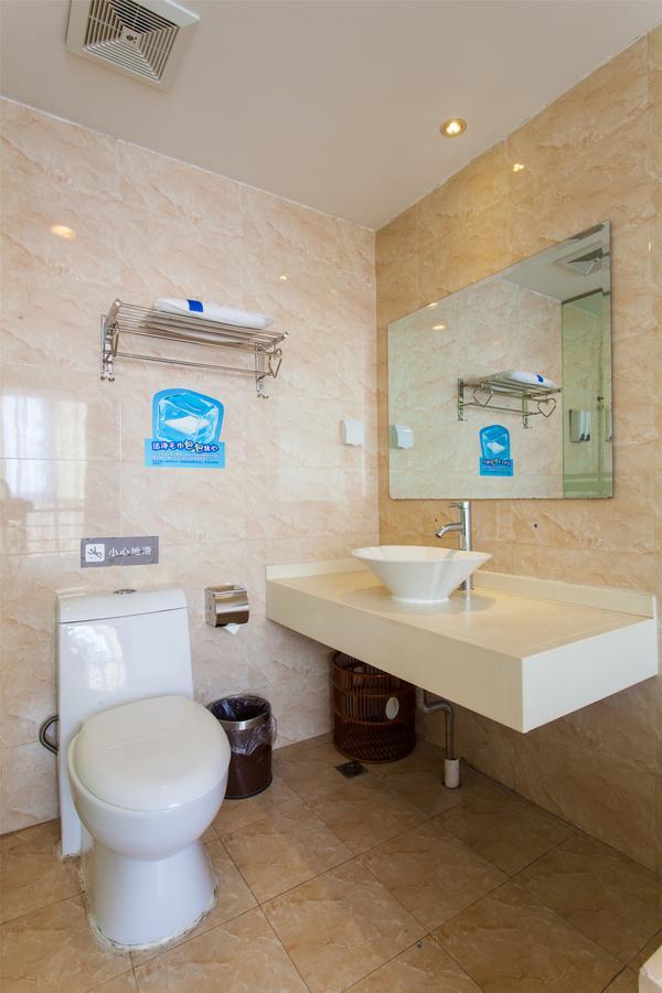 7Days Inn Qingdao Development Zone Jinshatan Quarto foto